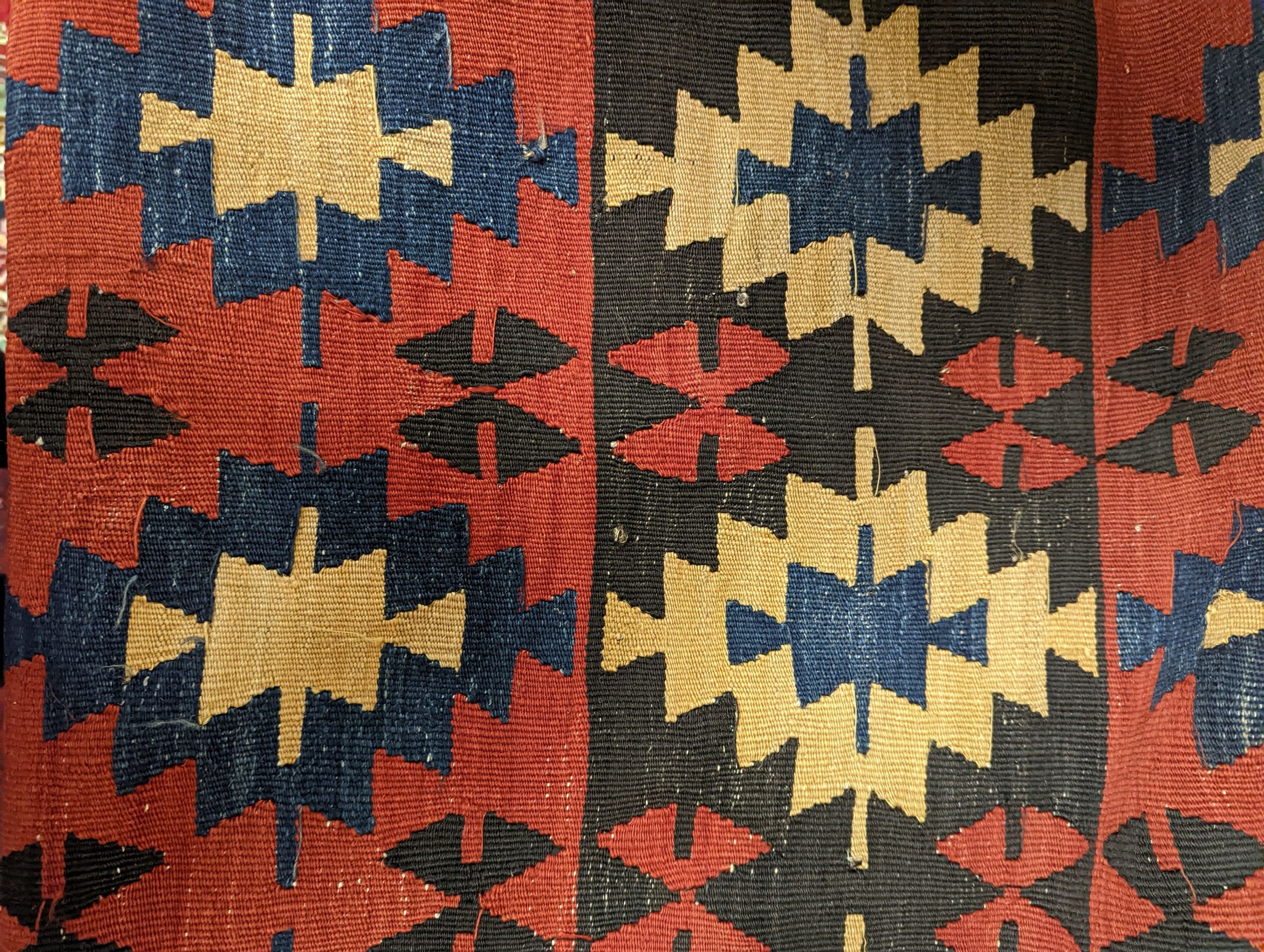 Two Kilim polychrome flatweave rugs, larger 200 x 130cm